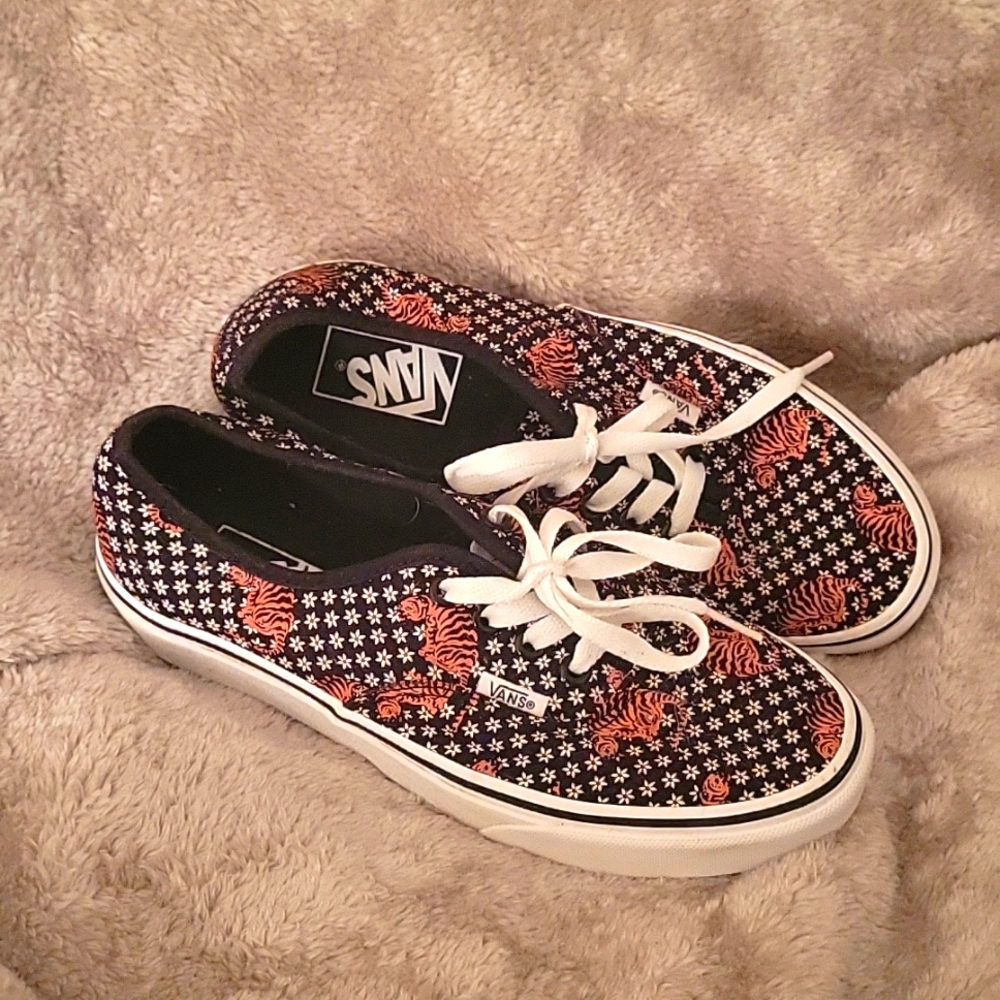 Vans sneakers size womens 7.5, black with flower and tiger print.